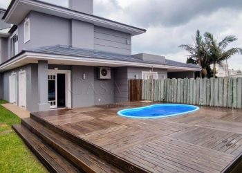 Casa para comprar ou alugar com 426m², 4 quartos, 4 suítes, 2 vagas no bairro Atlântida em Xangri-Lá