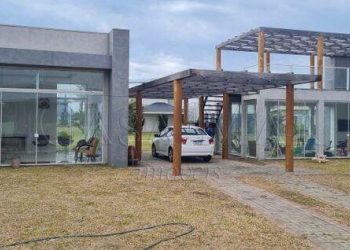 Casa em Condomínio à venda com 150m², 1 suíte, 1 vaga no bairro Condomínio Riviera em Xangri-Lá