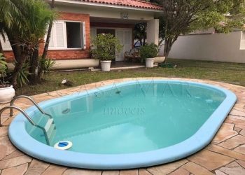 Casa para comprar ou alugar com 196m², 4 quartos, 2 vagas no bairro Atlântida em Xangri-Lá