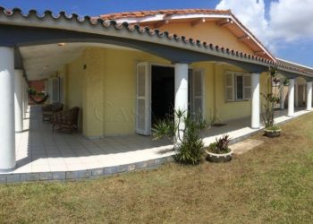 Casa para comprar ou alugar com 210m², 4 quartos, 1 suíte, 2 vagas no bairro Atlântida em Xangri-Lá
