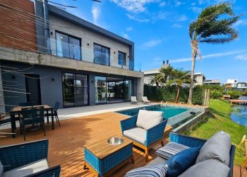 Casa em Condomínio à venda com 357m², 5 quartos, 5 suítes, 2 vagas no bairro Condomínio Sense em Xangri-Lá