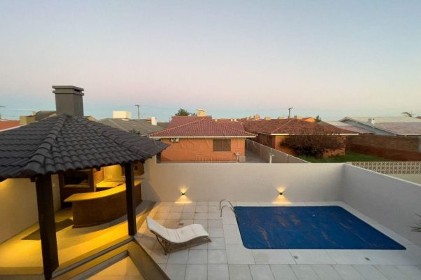 Casa à venda com 153m², 5 quartos, 5 suítes, 2 vagas no bairro Centro em Xangri-Lá - Foto 3