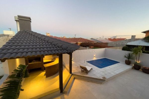 Casa à venda com 153m², 5 quartos, 5 suítes, 2 vagas no bairro Centro em Xangri-Lá - Foto 2