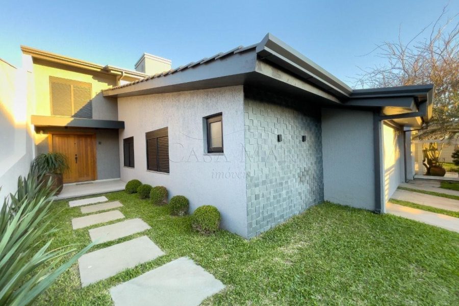 Casa à venda com 153m², 5 quartos, 5 suítes, 2 vagas no bairro Centro em Xangri-Lá - Foto 1